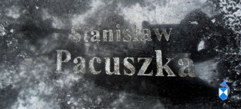Fragment tablicy nagrobnej z nazwiskiem Stanisław Pacuszka
